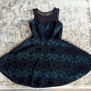 Sleeveless Black and Deep Green Mesh Yoke Fit & Flare Dress